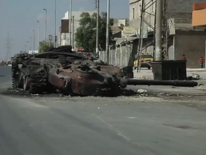 smoldering-tank-in-aleppo-wikimedia